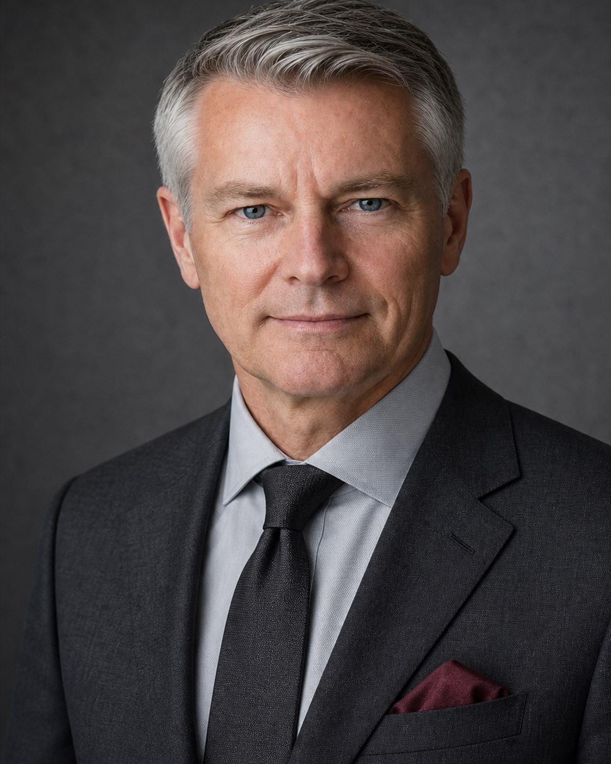 Norman Berg, Group Managing Director